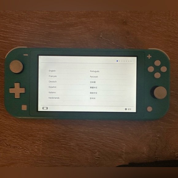 Nintendo Switch Lite Bundle - Picture 2 of 8